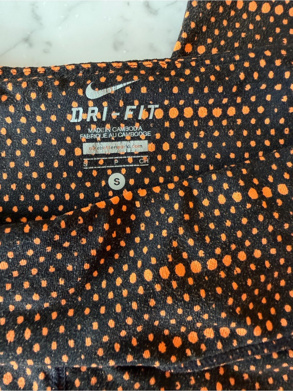 Nike Women’s Black Joggers with Orange Dot Pattern